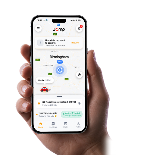 Hand holding smartphone showing JOMP app home screen